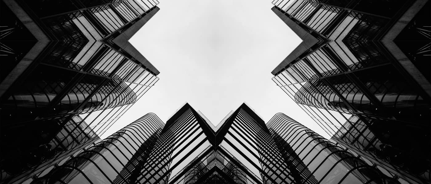 Abstract symmetrical facade of high-rise buildings
