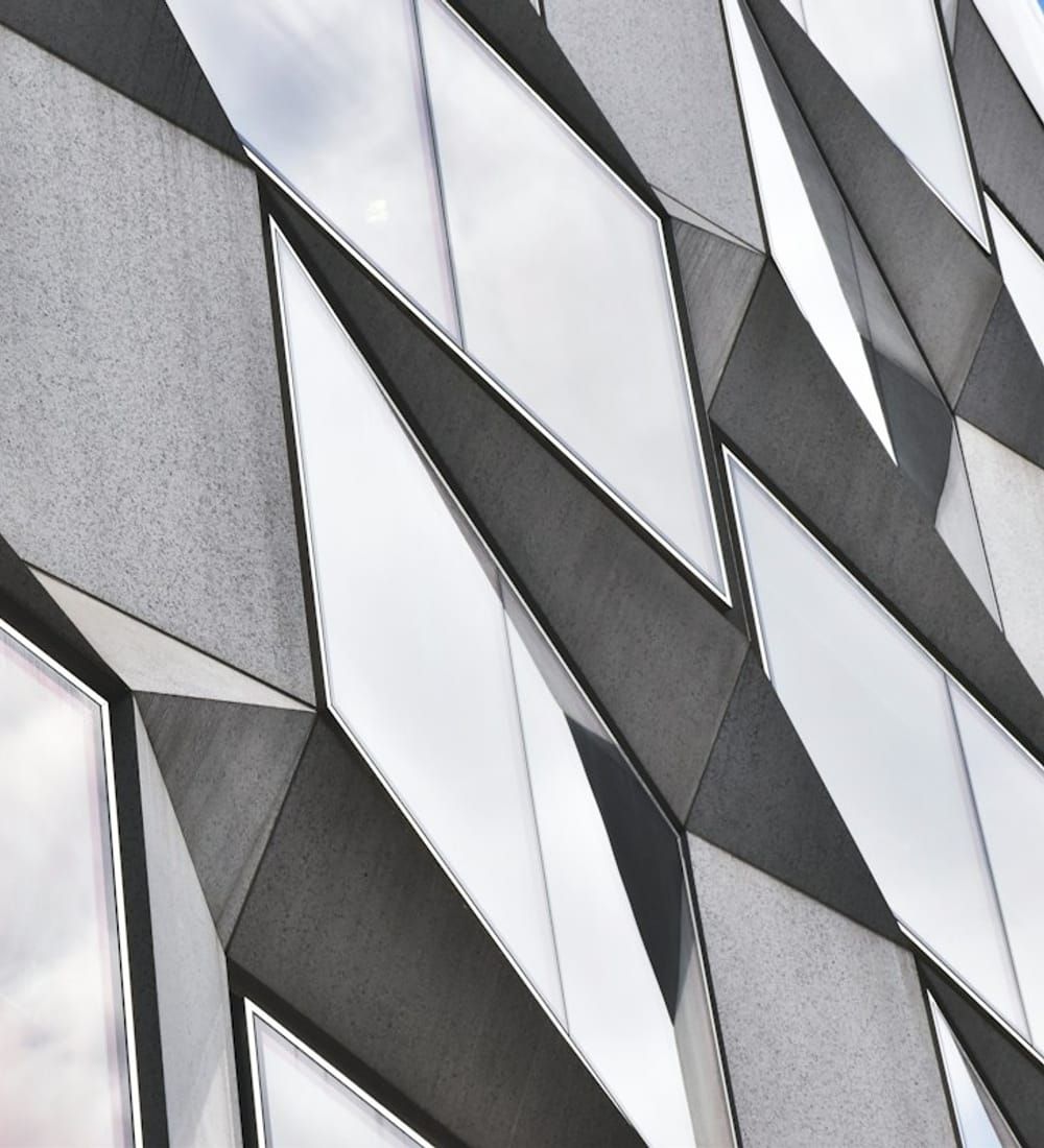 Angled glass panels on a building facade