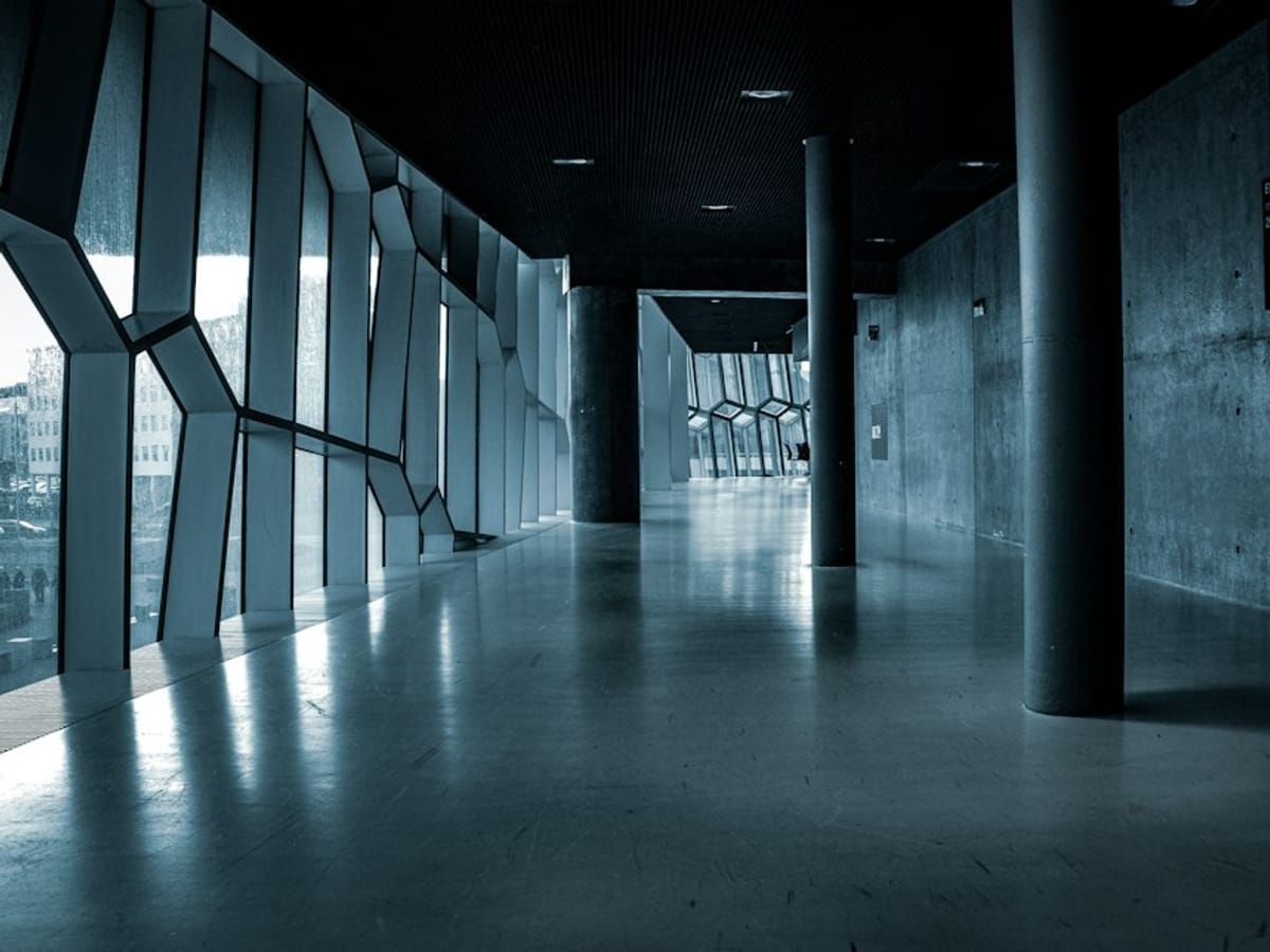Architectural interior: a concrete and glass corridor